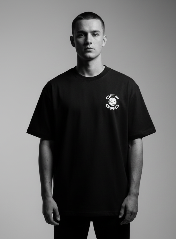 Model wearing OFFGRD Basketball Graphic tee in black, showcasing stylish design for basketball enthusiasts.