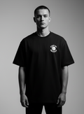 Model wearing OFFGRD Basketball Graphic tee in black, showcasing stylish design for basketball enthusiasts.